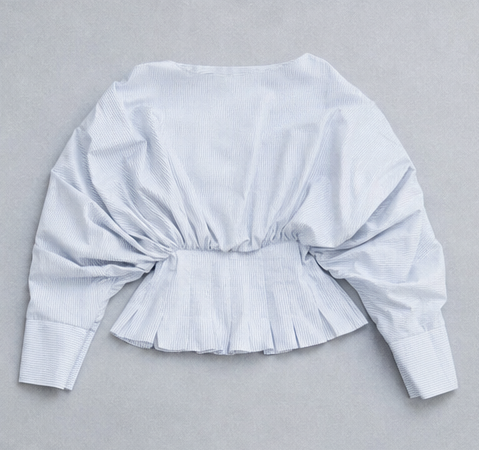 Pale blue pinstripe pleated peplum blouse